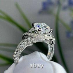 14K White Gold Plated Silver 2.50Ct Round Cut Moissanite Solitaire Twisted Ring