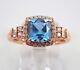 14k Rose Gold Plated 3 Ct Cushion Cut Simulated Blue Topaz Women's Wedding Ring