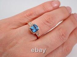 14k Rose Gold Plated 3 Ct Cushion Cut Simulated Blue Topaz Women's Wedding Ring