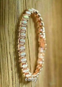 15.00Ct Oval Cut Simulated Fire Opal Tennis Bracelet 14K Rose Gold Plated Silver