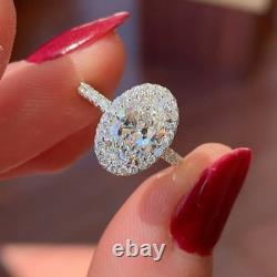 2.45 TCW Oval Cut Moissanite Halo Engagement Ring In 14k White Gold Plated