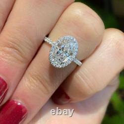 2.45 TCW Oval Cut Moissanite Halo Engagement Ring In 14k White Gold Plated