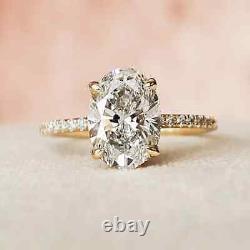 2 CT Oval Cut Moissanite Hidden Halo Engagement Ring 14k Yellow Gold Plated