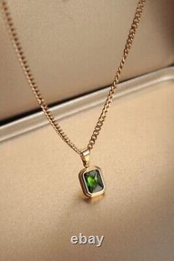 2Ct Emerald Cut Simulated Emerald Women's Pendant 14K Yellow Gold Plated Silver