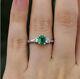 2ct Emerald Cut Simulated Green Emerald Three Stone Ring 14k White Gold Plated