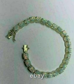 Beautiful 8Ct Oval Cut Fire Opal 7 Women Tennis Bracelet 14k Yellow Gold Plated