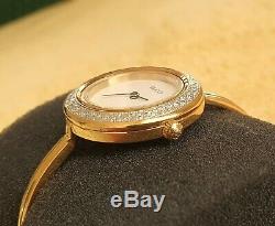 Gucci 11/12.2 18k GP Women's Bangle Watch with Diamond Cut metal Bezel (NR536)