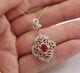 Lab Created 1.90 Ct Oval Red Ruby Flower Pendant 14k Yellow Gold Plated Silver