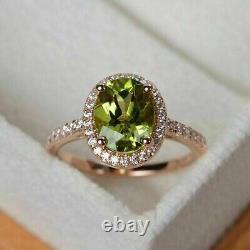 Oval Cut Simulated Green Peridot Halo Wedding Band Ring In 14k Rose Gold Plated