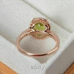 Oval Cut Simulated Green Peridot Halo Wedding Band Ring In 14k Rose Gold Plated