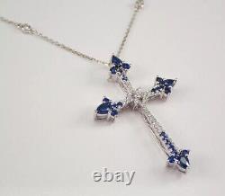 Round Cut Simulated Blue Sapphire Cross Pendant Chain In 14k White Gold Plated