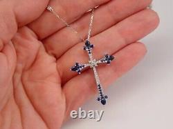 Round Cut Simulated Blue Sapphire Cross Pendant Chain In 14k White Gold Plated