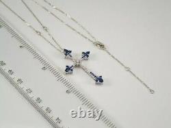 Round Cut Simulated Blue Sapphire Cross Pendant Chain In 14k White Gold Plated