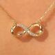 Stunning Infinity Pendant Round Cut Simulated Diamond In 14k Yellow Gold Plated