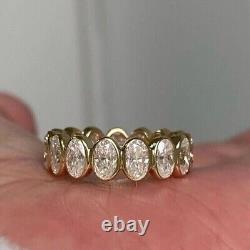 Bague de mariage éternité en diamant simulé à taille ovale avec serti en or jaune 14 carats.