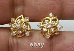 Boucles d'oreilles clou en forme de fleur avec diamants simulés coupés en rond plaqués or jaune 14 carats
