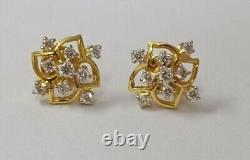 Boucles d'oreilles clou en forme de fleur avec diamants simulés coupés en rond plaqués or jaune 14 carats