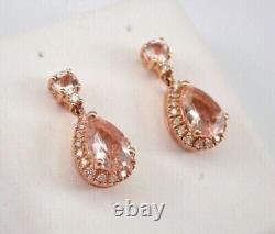 Boucles d'oreilles pendantes en plaqué or rose 14 carats avec halo de morganite pêche simulée en forme de poire